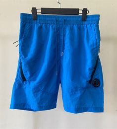Nuevos pantalones de verano para jóvenes al aire libre Sports Nylon Couts Shorts Flowing Men's Beach 5 puntos Pantalones