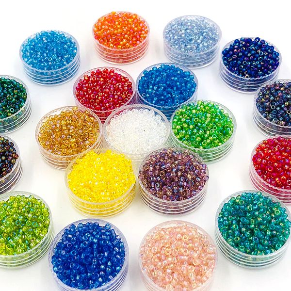 Nuevo soporte al por mayor de 2 mm 10g/paquete de vidrio transparente cuentas de prenda de color de 19 colores Beads de semillas de cristal accesorios de bricolaje