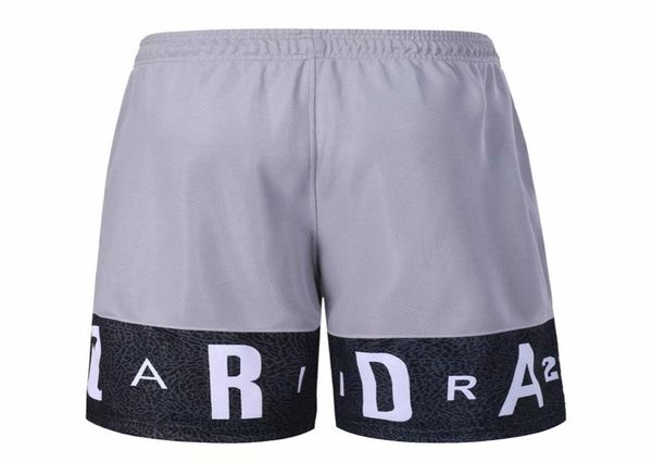 New Sy Men Basketball Shorts avec poches à fermeture éclair