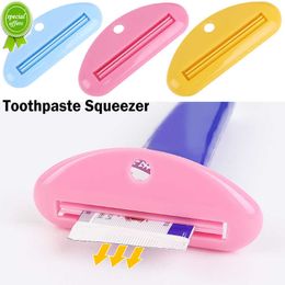 Nuevo exprimidor de pasta de dientes, dispensador de pasta de dientes de plástico para el baño del hogar, Clips para crema limpiadora de pasta de dientes, exprimidor de tubo de muestra