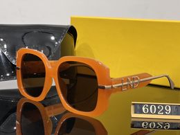 Nieuwe topdesign zonnebril voor dames heren Mode zonnebril UV-bescherming grote verbindingslens Frameloos geleverd met pakket 6029 hoes