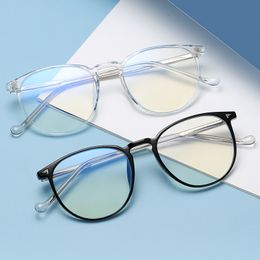 Nuevo tr90 marco redondo transparente tendencia de marco completo hombres y mujeres literarios de vanguardia pueden equiparse con gafas de miopía anti-luz azul Ciencia 0 grados