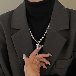 Nueva moda Otoño Invierno collar de mujer cadena de clavícula letra suéter ligero collar