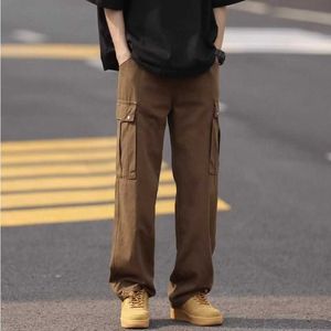 Nieuwe trendy casual losse broek met grote zakken en rechte pijpen met vier seizoenen eenvoudige effen kleur werkkleding voor high street mannen