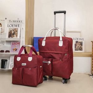 Nouveau sac trolley femme grande capacité sac à bagages sac à main sac de rangement de voyage pliant sac à dos à roue universel