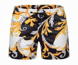 Nuevos pantalones cortos de moda de verano tropical nuevo tablero de diseñador corto traje de baño de secado rápido tablero de impresión pantalones de playa men039s pantalones cortos de natación6667821