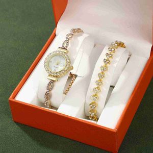 Nieuwe tweedelig modieuze diamant ingelegde dames horloge kwarts verstelbare armband geschenkdoos