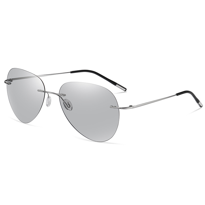 New ultra-light titanium light polarized frameless color-changing sunglasses men driving blue glasses day and night.
