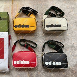 Nuevo diseñador de moda unisex Deportes al aire libre Lujo AD Messenger Bag Bolso bandolera Bolso de mano Alta calidad TOP 5A 702427 Monedero Bolsa