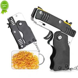 Nouveau universel Mini porte-clés voiture porte-clés jouet pistolet tir pistolet enfant fête en plein air pliant métal pistolet cadeau voiture style porte-clés