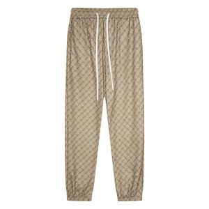 Nuevos pantalones de terciopelo a la moda masculina y femenina de cinco estrellas Pantalones de pareja casual Manga recta pantalones de fondo cálido M-2xl