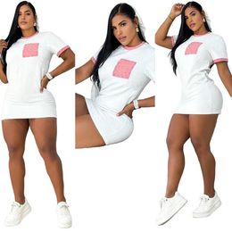 Nieuwe witte reliëf met korte mouwen Casual Dress merkontwerper Bodycon Sexy Hollow Out V-Neck mini rokjurken
