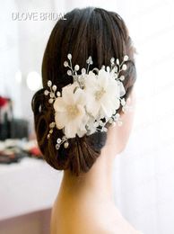 Nieuwe witte rode bruidshaarbloemen verkopen hoge kwaliteit bruiloft kristal flexibel haaraccessoire bloemen Sydney bruidshoofdtooi Hea3747481