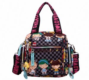 Nouvelle femme Sac à bandoulière couleur bonbon 2021 Sac de cowboy Jolie fille Harajuku Sac à main pour bébé Multi-fonction Oxford Tissu Menger Sac 63XX #