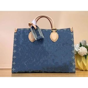 Nouveau sac à main en denim bleu pour femme Sac de créateur Vieux sac à fleurs Nouveau sac à main de luxe en relief Sac à bandoulière Designers Femme Sac à bandoulière Sac à bandoulière