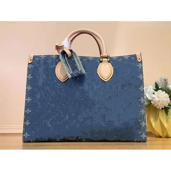 Nuevo bolso de diseñador de bolsos de mezclilla azul para mujer Bolso de flores viejas Nuevo bolso de lujo en relieve Bolso de hombro Diseñadores Mujer Bolso cruzado Bolso cruzado
