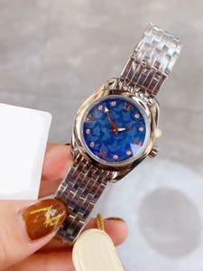 Nouvelle montre à quartz pour femme Mode dames papillon bleu montres Casual en acier inoxydable numéro romain Horloge 28mm de haute qualité