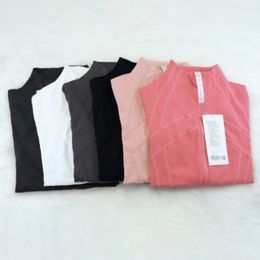 Nueva chaqueta de mangas largas de yoga para mujeres Color sólido Nude Sports Shaping Wist Fiess Fise Jogging Sportswear