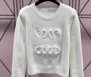 Nieuwe damestrui herfst trendy top met lange mouwen high-end slanke trui jas ontwerper trui dames witte dunne gebreide truien