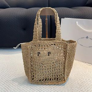 Nouveaux sacs d'épaule tissés Sacs de plage pour femmes concepteurs sacs fourre-tout de paille creux sac à main de haute qualité sac en raffie