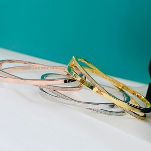 Nieuwe x armband voor vrouwen met diamanten kruisen gouden armband t exclusieve designer sieraden dames feest bruiloft geschenken
