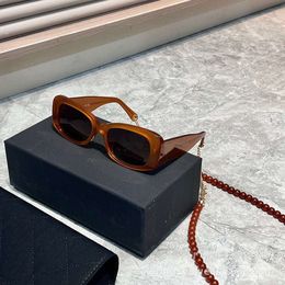 Nuevas gafas Xiaoxiang populares en Internet, el mismo estilo, tono caramelo, gafas de sol medievales con cadena de cuentas marrones para mujer, gafas de sol modernas