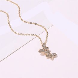 Nieuwe20pcs / lot Japan Koreaanse stijl vlinder hanger kettingen volledige diamant eenvoudige sleutelbeen ketting voor dames geschenk metalen dier ketting sieraden