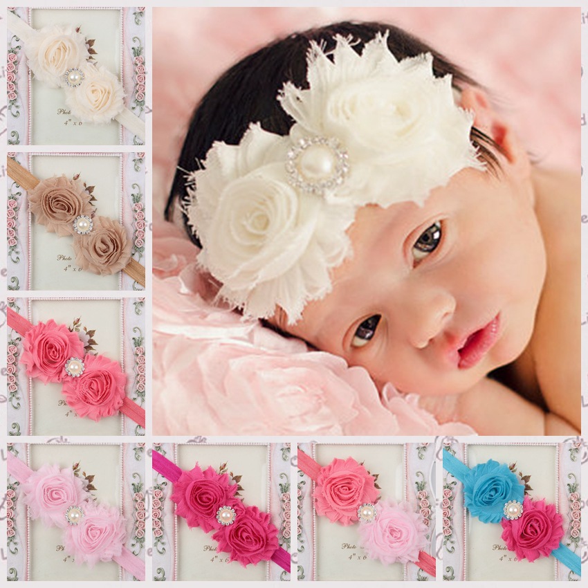 Piezas de cabeza de bautizo de niña recién nacida 2017 con flores de mano Perlas 28 colores diferentes Diademas de niña pequeña para bebés Boda de cumpleaños