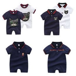 Marque d'été Designer Kids Clothes Girls Boys Tracksuis Tracks Cartoon Imprimé Pure 100% Coton Colaire à manches Nouveau-Born