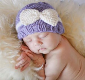 Pasgeboren baby winter warme croceht hoed boog schattige handgemaakte breien oormof baby gebreide hoeden bowknot caps kbh341846160