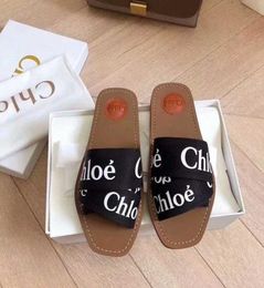 NOUVELLES Femmes de marque Woody Mules Fflat Slipper Deisgner Latheting Tissu en cuir extérieur sandal Sandal2385304