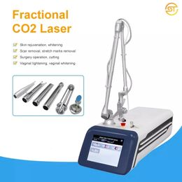 Le plus récent système laser CO2 fractionné élimine les vergetures dans toutes les zones du corps, élimine les rides, resurfaçage de la peau, traitement de rajeunissement, machine laser