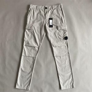 Le plus récent pantalon Cargo teint en vêtement un pantalon de poche à lentille en plein air hommes pantalon tactique survêtement ample taille M-XXL CP