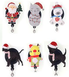 Les nouveaux anneaux clés de Noël Santa Claus Snowman Snowman Dog Ramionnage rétractable Habinet Holiday ID pour infirmière Nom Accessoires Badge Reel 2166750