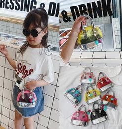 Nouveaux enfants sacs à main mode coréenne bébé filles Mini princesse sacs à main bandoulière mignon gelée sacs à bandoulière transparents collations pièce de monnaie Bag9403380