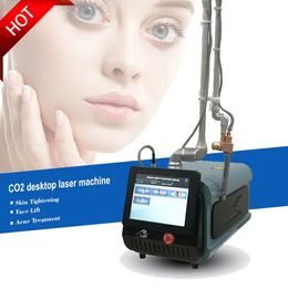 La plus récente machine laser Co2 multifonctionnelle de haute technologie Serrer les soins de la peau du vagin Rajeunissement de la peau Indolore Vergetures Enlèvement des cicatrices Équipement de salon de beauté