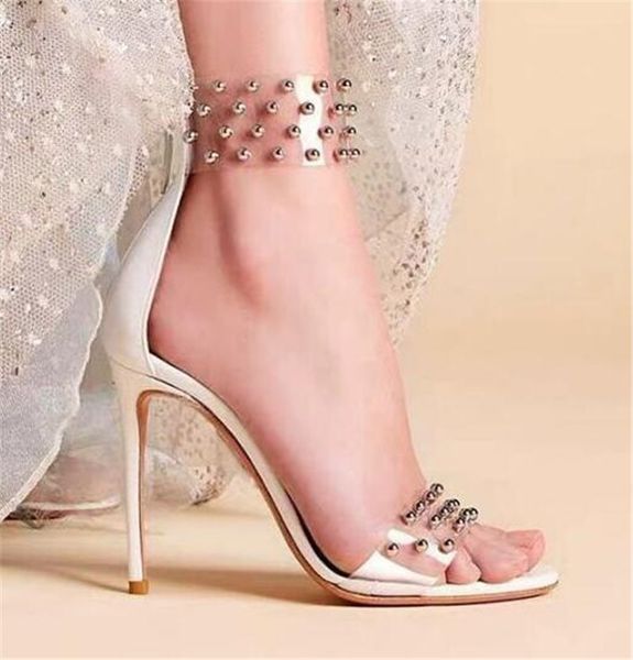 Les plus nouvelles femmes mode ouverte ouverte claire pvc rivet perlé taletto arrière transparent zipper-up talons hauts sandales talons chaussures