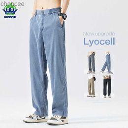 Nieuw opgewaardeerde lyocell -stoffen jeans mannen los rechte zomer elastische taille casual denim broek mannelijke dunne broek groot formaat 5xllf20230824.