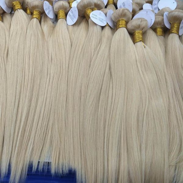 Belle couleur 613 cheveux humains russes blonds extensions non remy trames 4pcs / lot sans odeur entretien facile