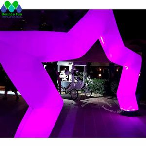 Arc d'entrée gonflable brillant en forme d'étoile avec lumière LED colorée pour la décoration de fête