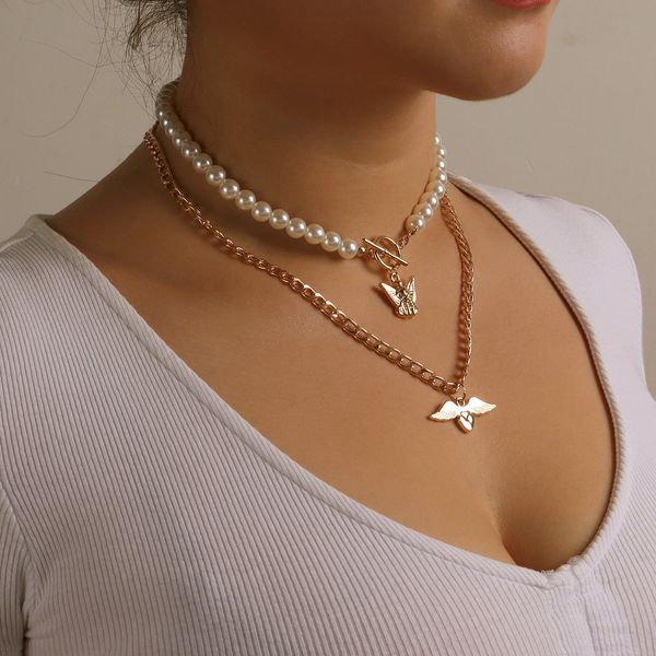 diseño de nicho nueva tendencia de moda Pearl Notre Dame de dos pisos, alas de ángel collar de temperamento en forma de corazón joyas de alta gama para niñas 01