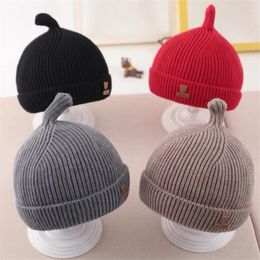 Sombrero de pezón bebé nuevo otoño e invierno sombrero de punto para niños color simple cálido sombrero de lana para bebé
