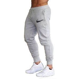 NK Diseñador de lujo para hombre Joggers Fitness Marca Pantalones Baloncesto Correr Chándal Ropa de alta calidad Hombres Pantalones de chándal casuales Gimnasios Pantalón Nueve Pantalones