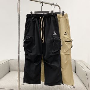 NK X ACG logo hommes femmes imperméable à l'eau en plein air charge salopette poche 3D coupe pantalons décontractés