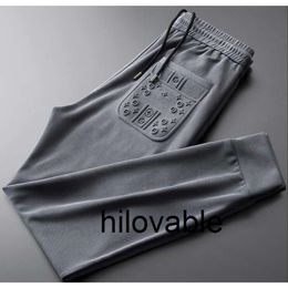 No logo fashions hilovable hommes pantalons de jogging poche Fitness Leggings doux taille haute hanche ascenseur élastique pantalons décontractés cordon jambes pantalons de survêtement M-5XL