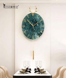 Horloge murale oscillante décorative en métal silencieux d'élan nordique montre de Design moderne salon décor à la maison cadeaux de décoration de noël 21046864159