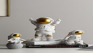 Figurines miniatures d'astronaute moderne nordique Résine Artisanment maison Fairy Garden Desk Decoration Fénérant Articles Accessoires de chambre 2019451992