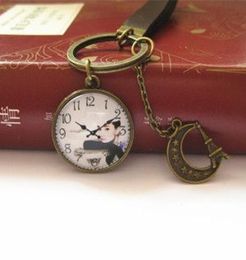 Novedad Audrey Hepburn llavero Cameo reloj llavero Vintage cuero llavero joyería hecha a mano k0014554879