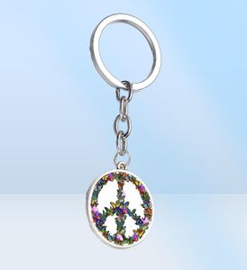 Nouveauté combinaison de papillon signe de paix Keychain Diy Hippie Peace Bus Signe Verre Cabochon Pendante Charme clé Ring6951936