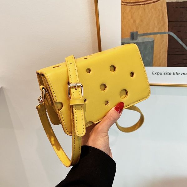 Nouveauté fromage modèle sacs à bandoulière pour les femmes de manière créative trous conception sac à bandoulière dame élégant sacs à main et sacs à main tendance 220727